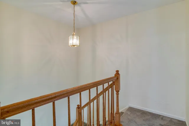 a view of a bathroom from a hallway