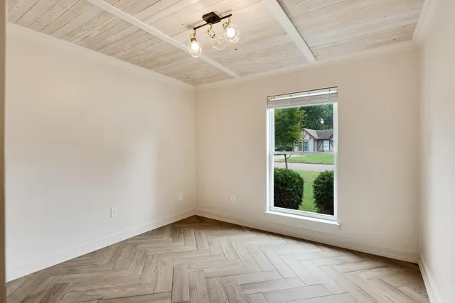 an empty room with windows