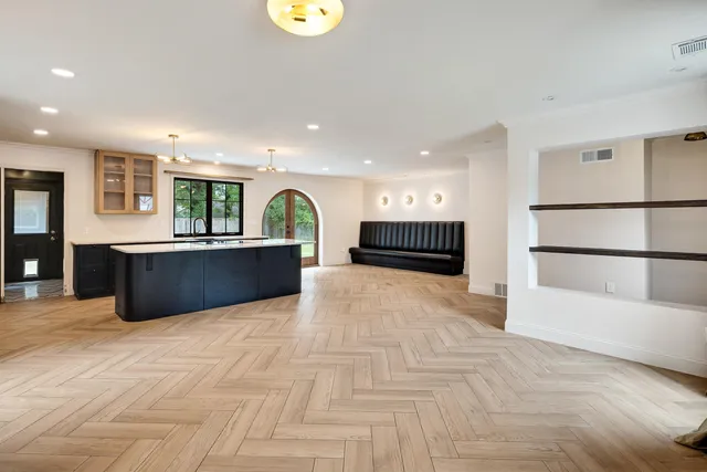 a view of kitchen with furniture and a window