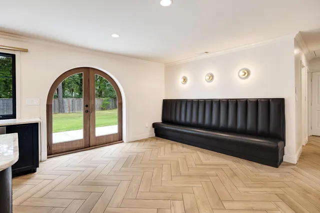 a view of livingroom with furniture and front door