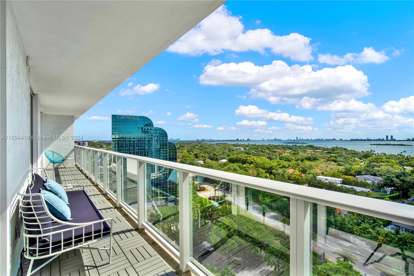 4250 Biscayne Boulevard, Unit 1607 Miami, FL 33137 - Photo 1 of 21 a view of balcony with wooden floor and fence