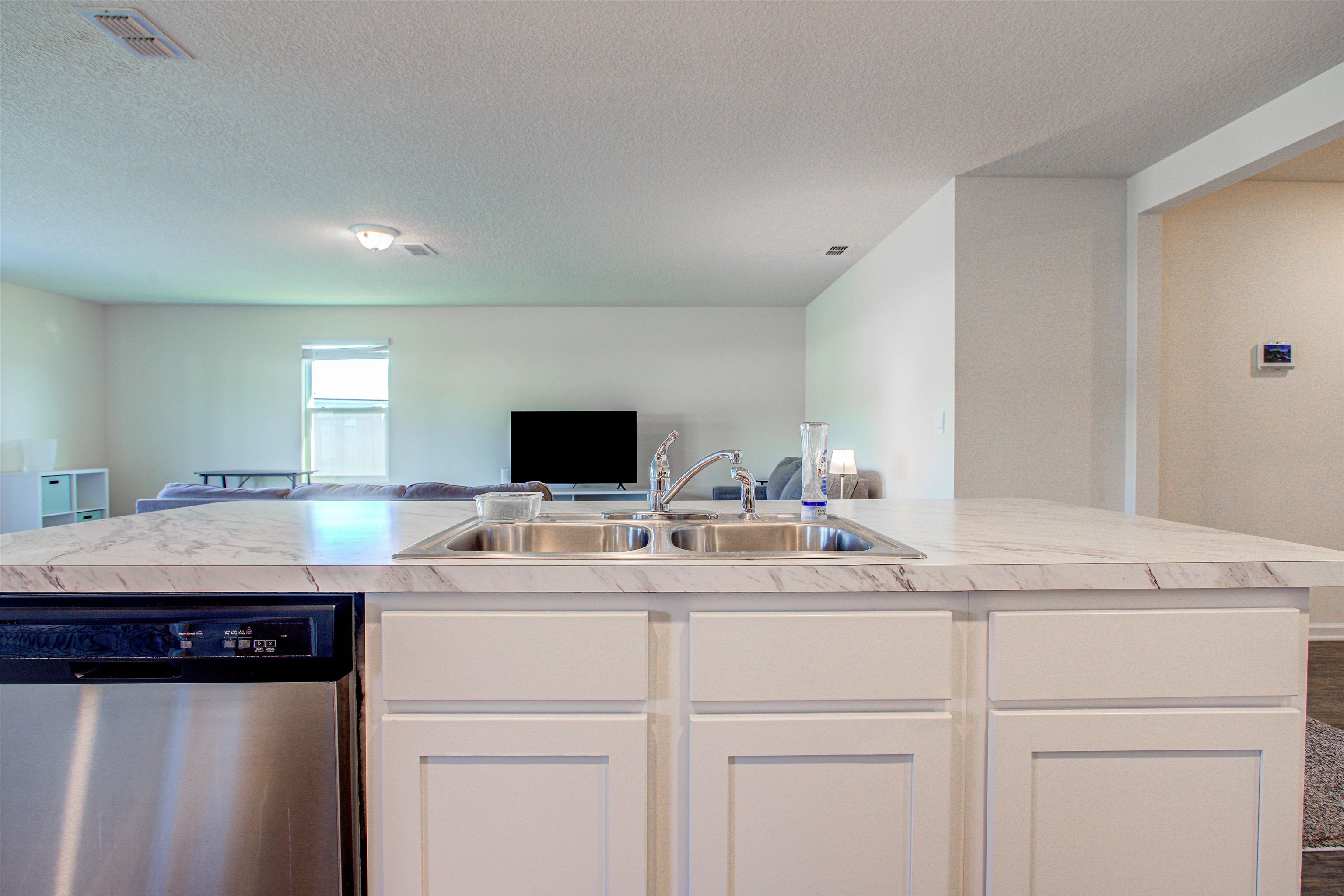 108 Albacete Road St. Augustine, FL 32084 - Photo 37 of 37 a kitchen with a sink and a refrigerator