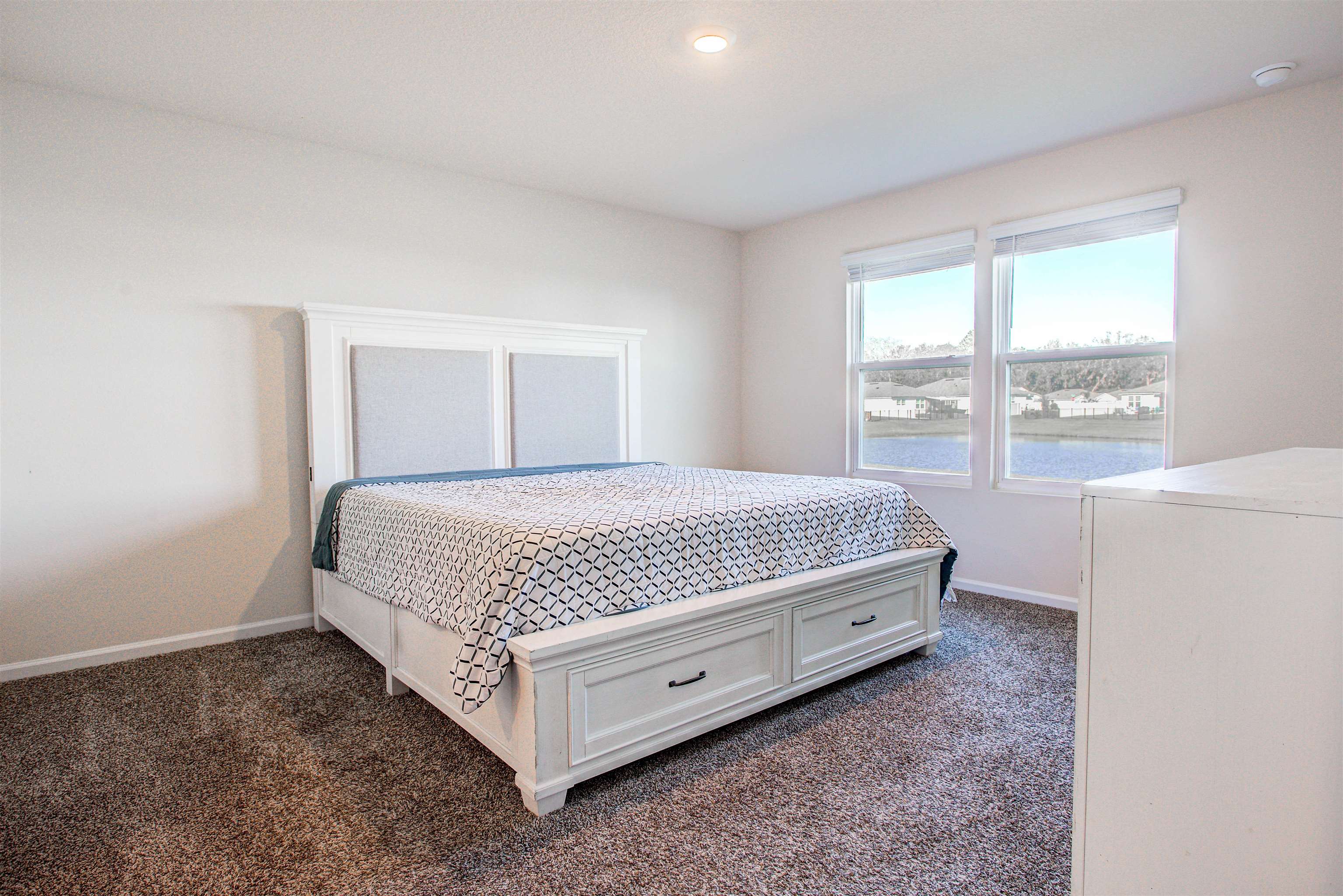 108 Albacete Road St. Augustine, FL 32084 - Photo 24 of 37 a bedroom with a bed and window