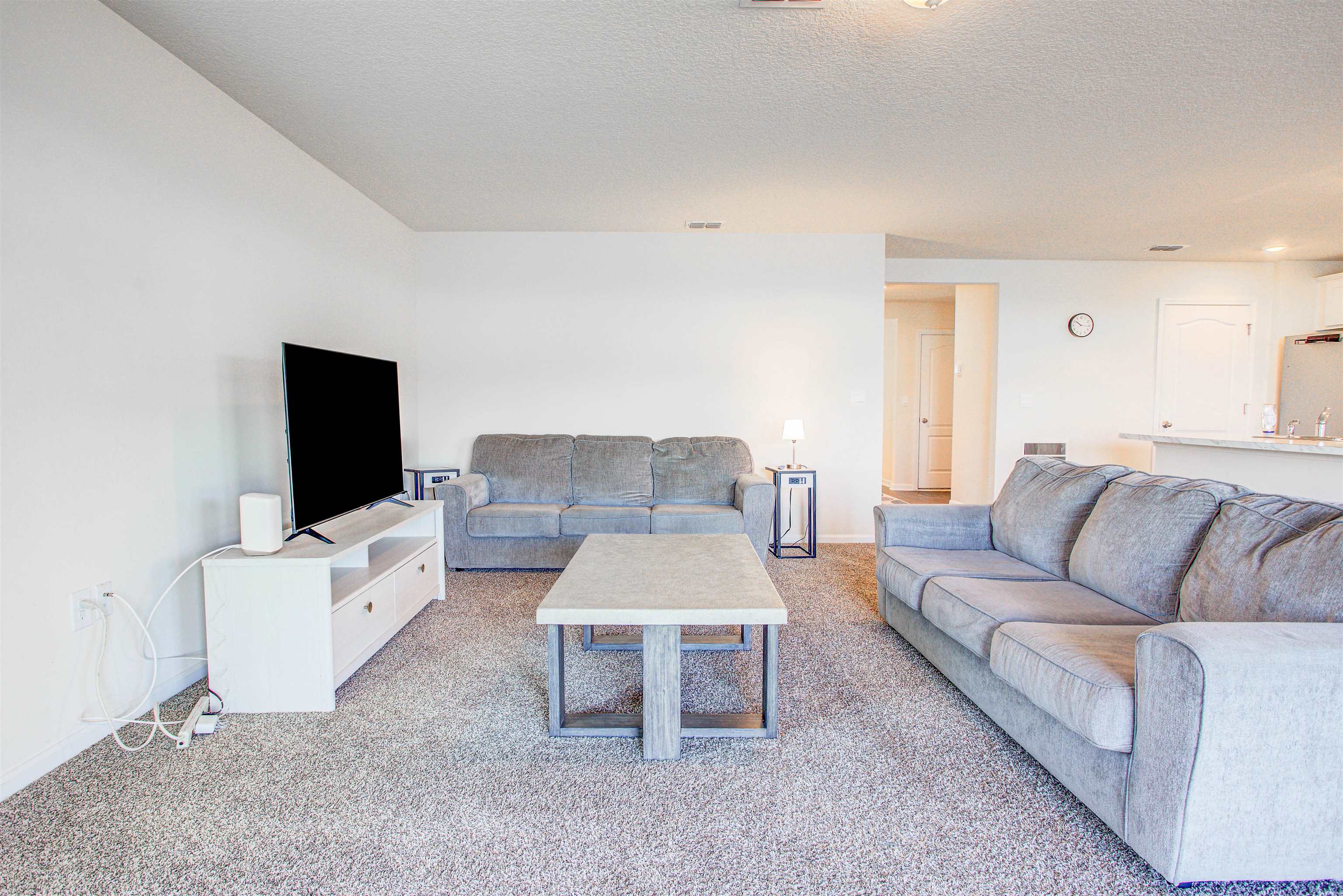 108 Albacete Road St. Augustine, FL 32084 - Photo 10 of 37 a living room with furniture and a flat screen tv