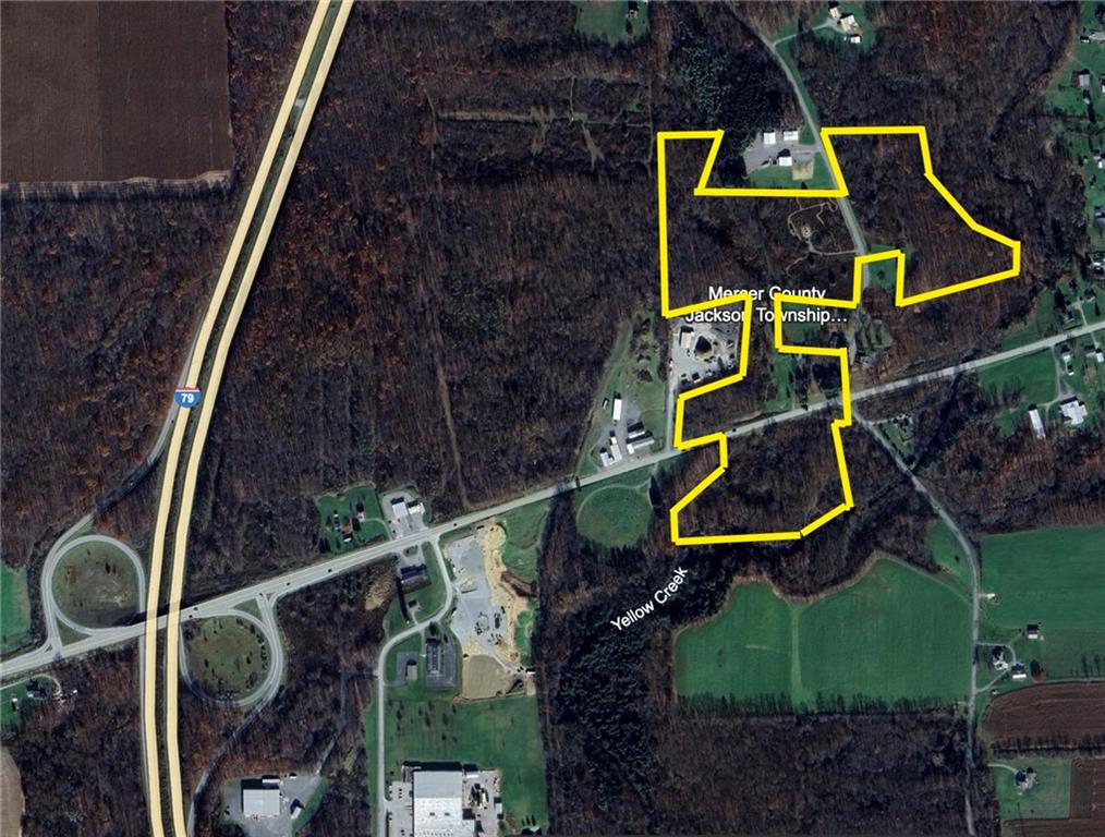 an aerial view of house with swimming pool