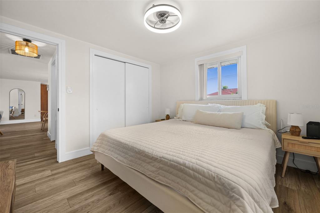 219 Coral Road Venice, FL 34293 - Photo 15 of 24 a bedroom with bed and a window