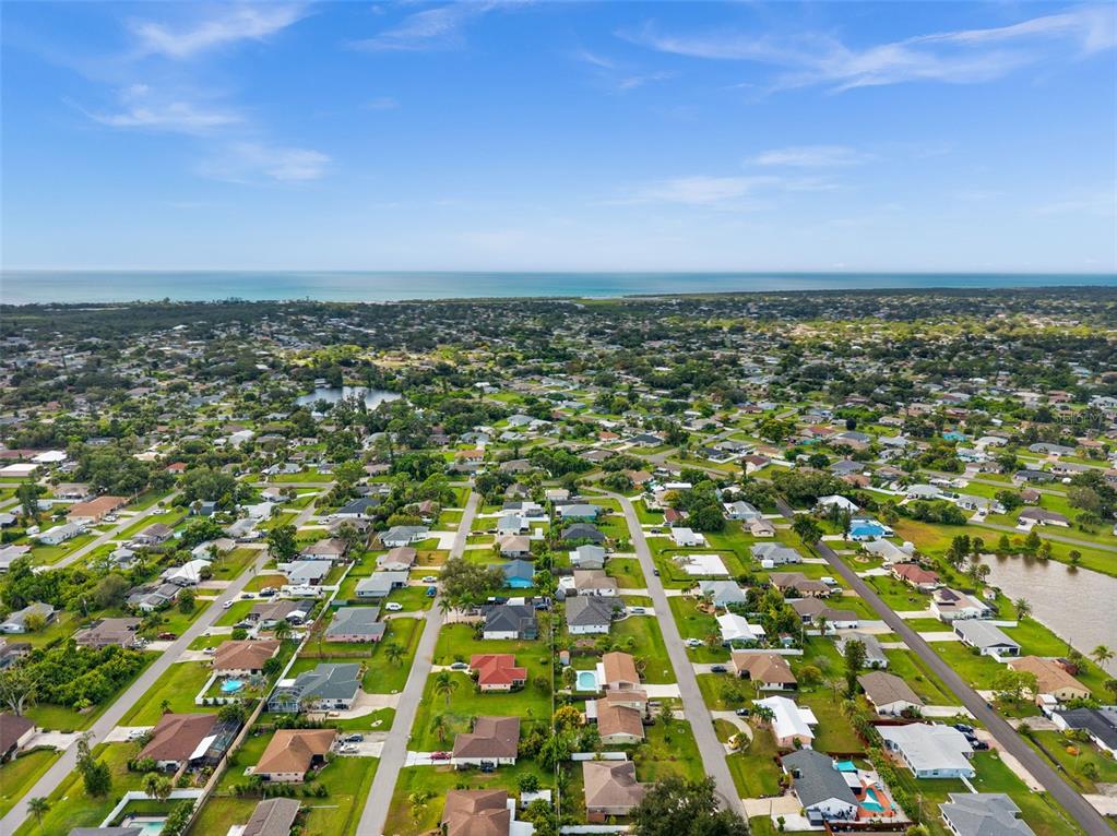 219 Coral Road Venice, FL 34293 - Photo 2 of 24 an aerial view of residential houses with outdoor space