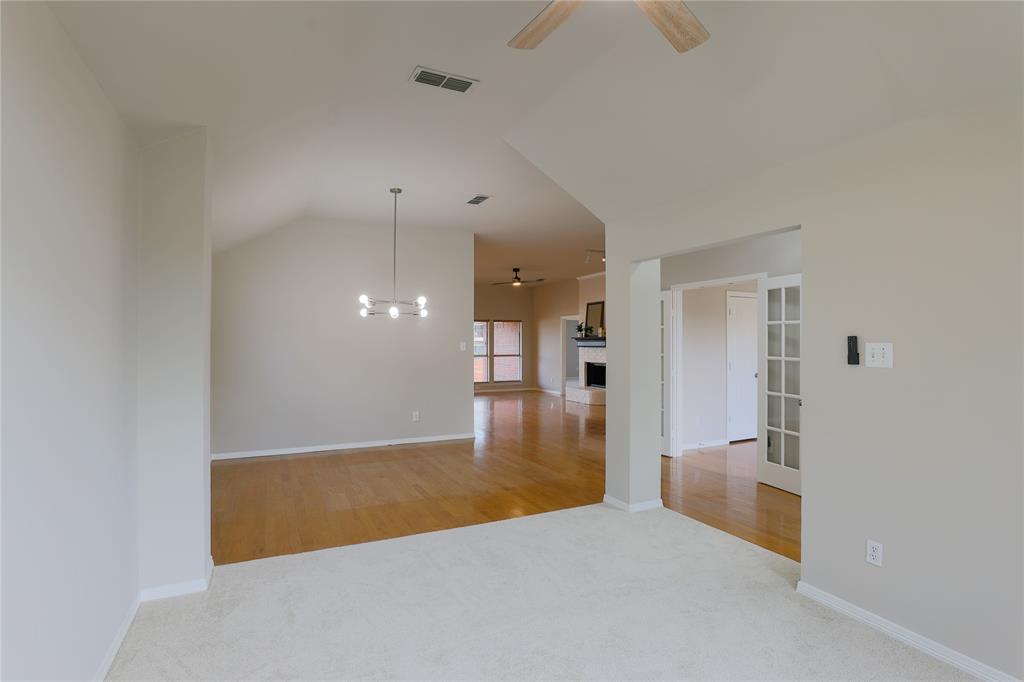 3616 Sutter Court Fort Worth, TX 76137 - Photo 15 of 28 a view of a kitchen with a sink and a refrigerator
