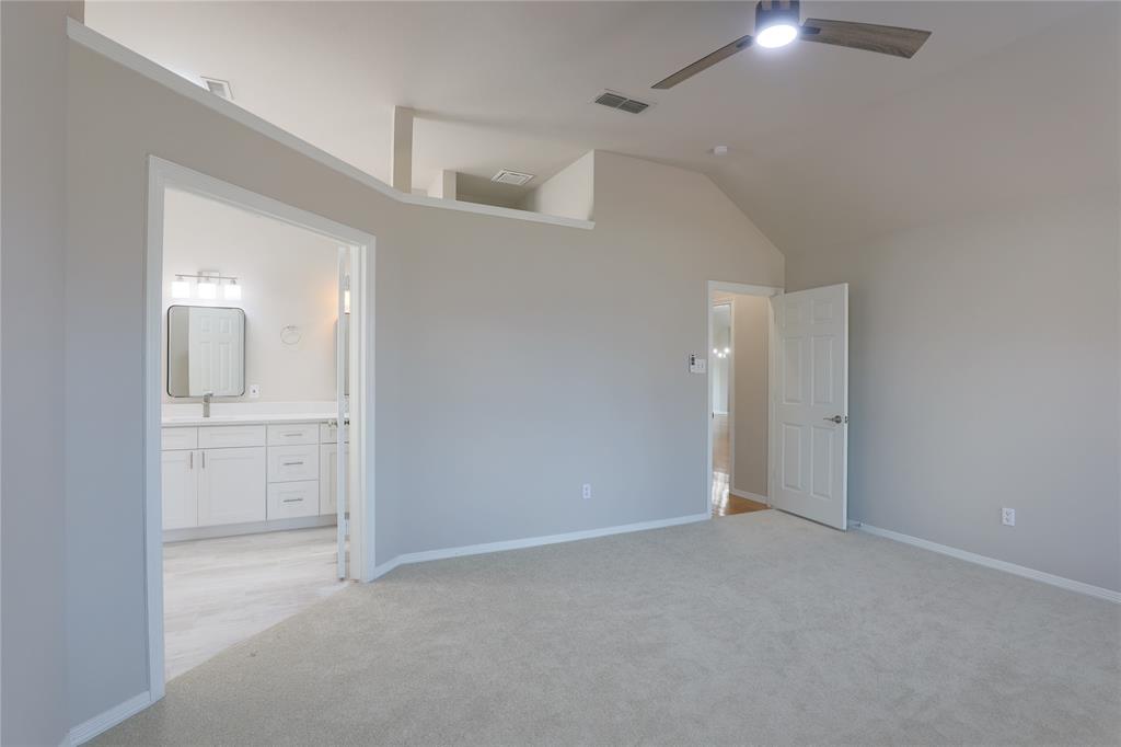 3616 Sutter Court Fort Worth, TX 76137 - Photo 16 of 28 an empty room with a bathroom and mirror