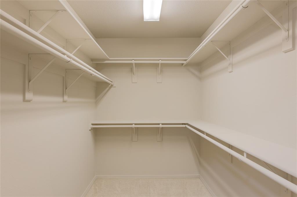 3616 Sutter Court Fort Worth, TX 76137 - Photo 22 of 28 a view of an empty walk in closet