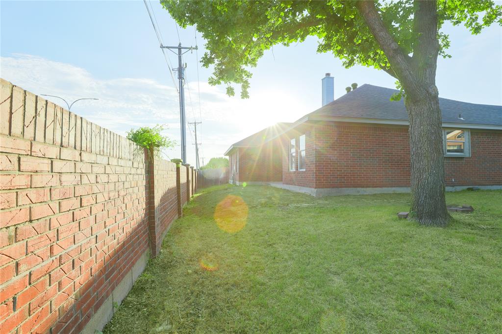 3616 Sutter Court Fort Worth, TX 76137 - Photo 27 of 28 a view of a backyard