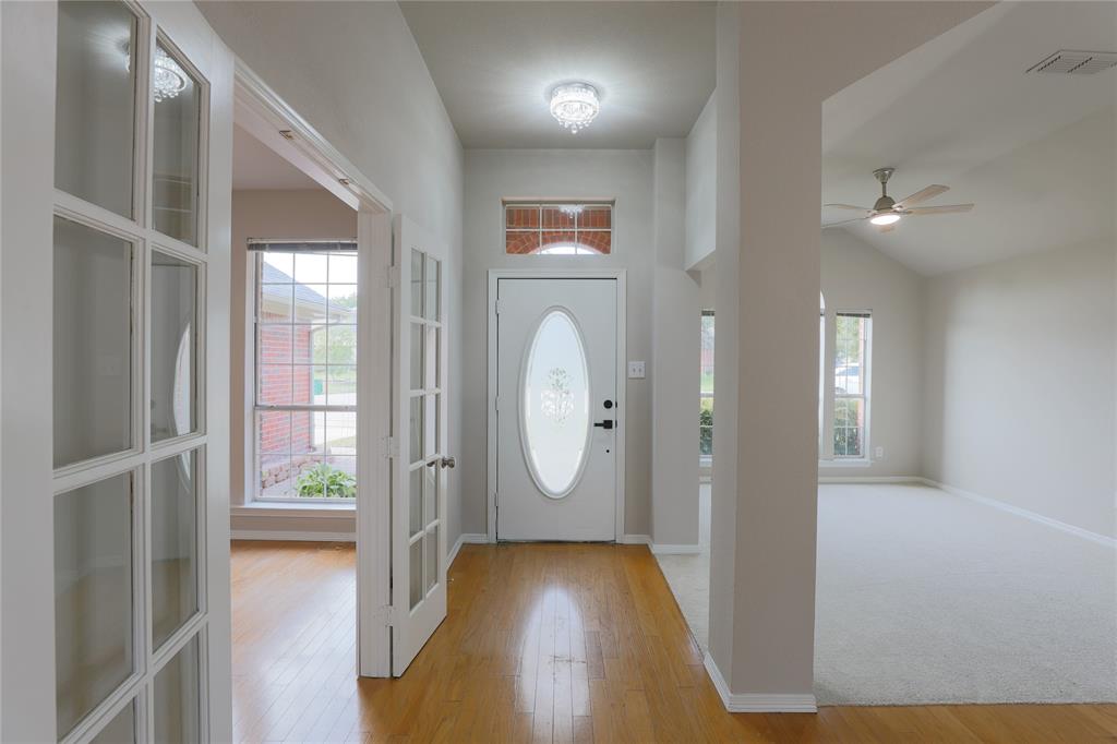 3616 Sutter Court Fort Worth, TX 76137 - Photo 5 of 28 a view of entryway with wooden floor