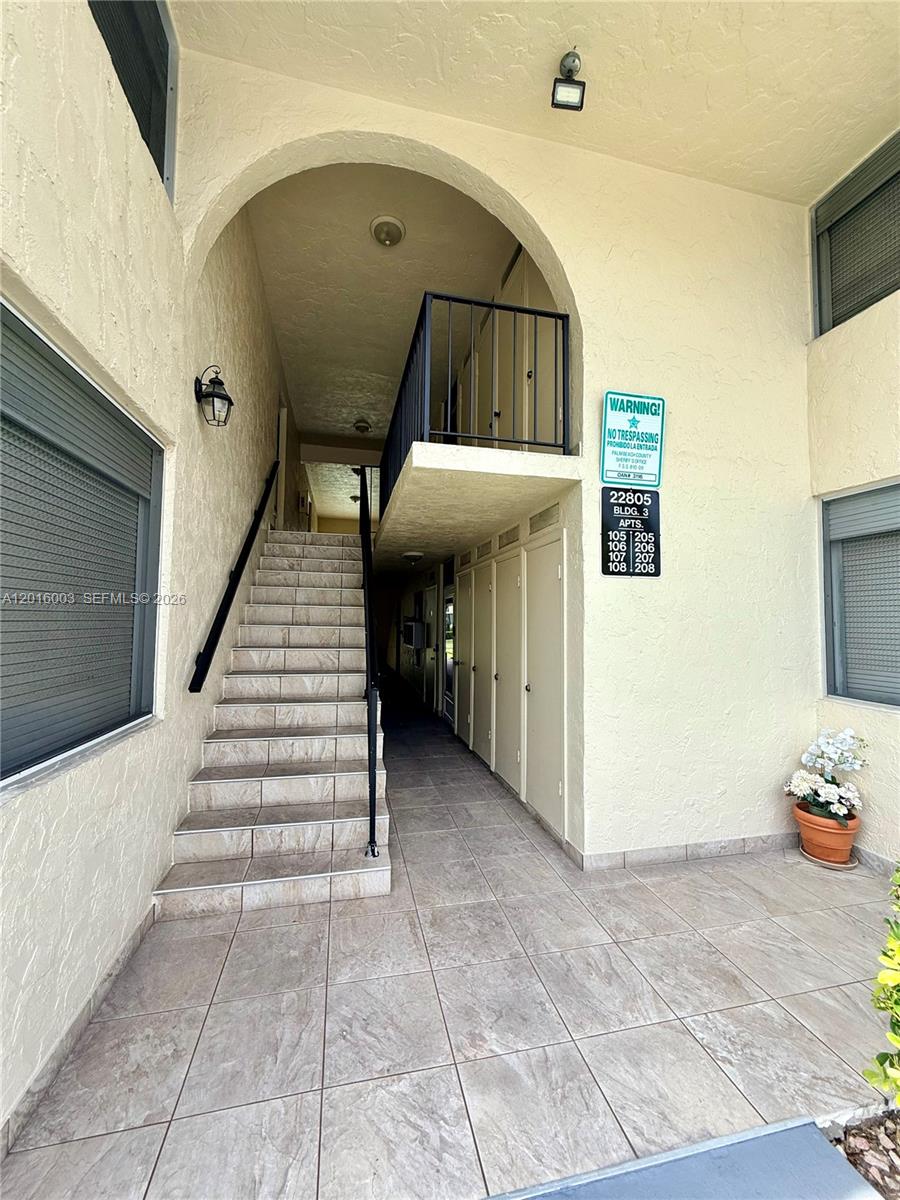 22805 Southwest 66th Avenue, Unit 208 Boca Raton, FL 33428 - Photo 12 of 28 a view of entryway and hall