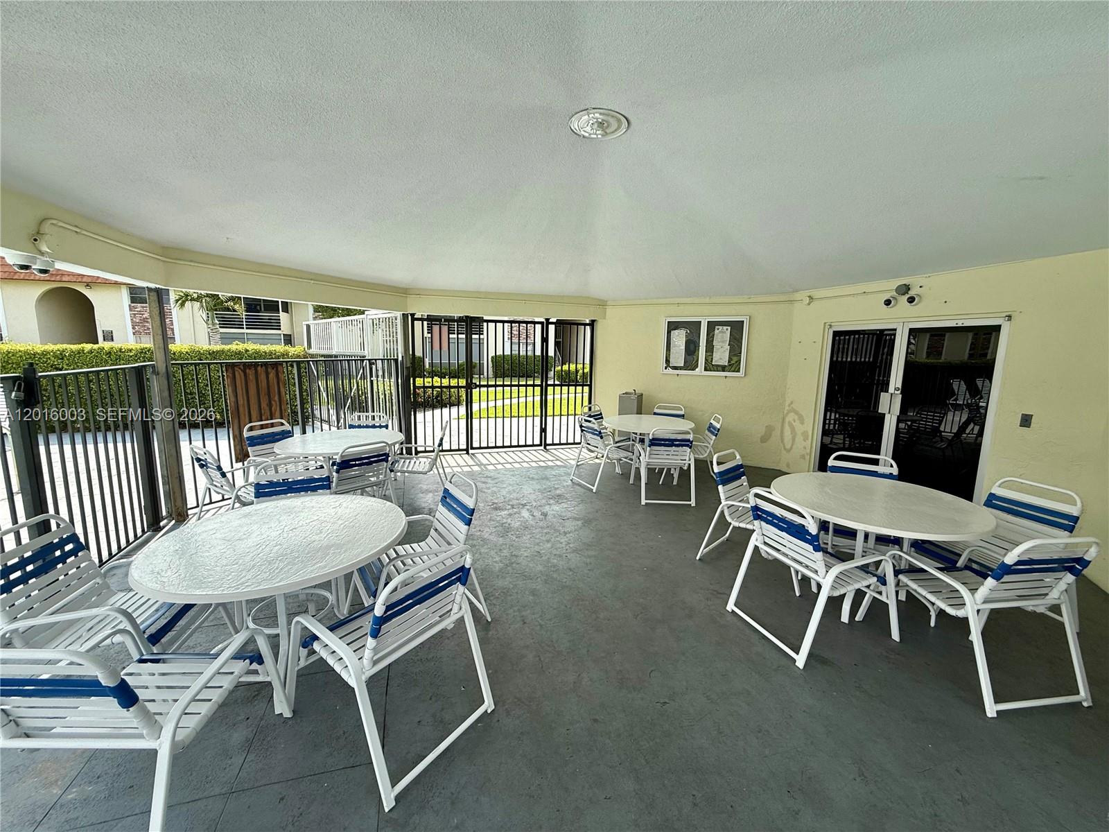 22805 Southwest 66th Avenue, Unit 208 Boca Raton, FL 33428 - Photo 5 of 28 a outdoor space with furniture