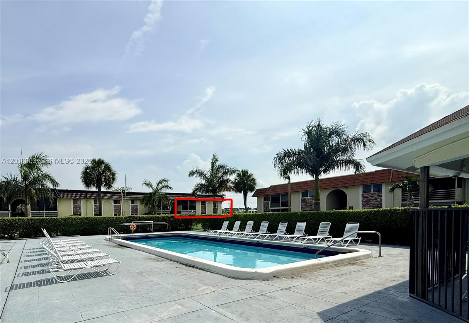 22805 Southwest 66th Avenue, Unit 208 Boca Raton, FL 33428 - Photo 7 of 28 a view of a house with swimming pool and sitting area