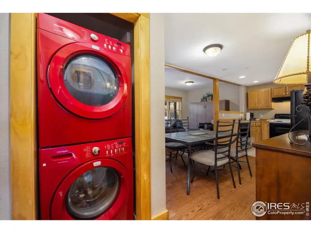 a view of a kitchen with a washer and dryer