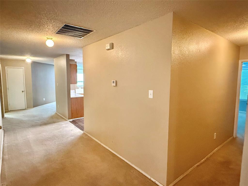 930 Dunkirk Lane Arlington, TX 76017 - Photo 14 of 35 spacious hallway