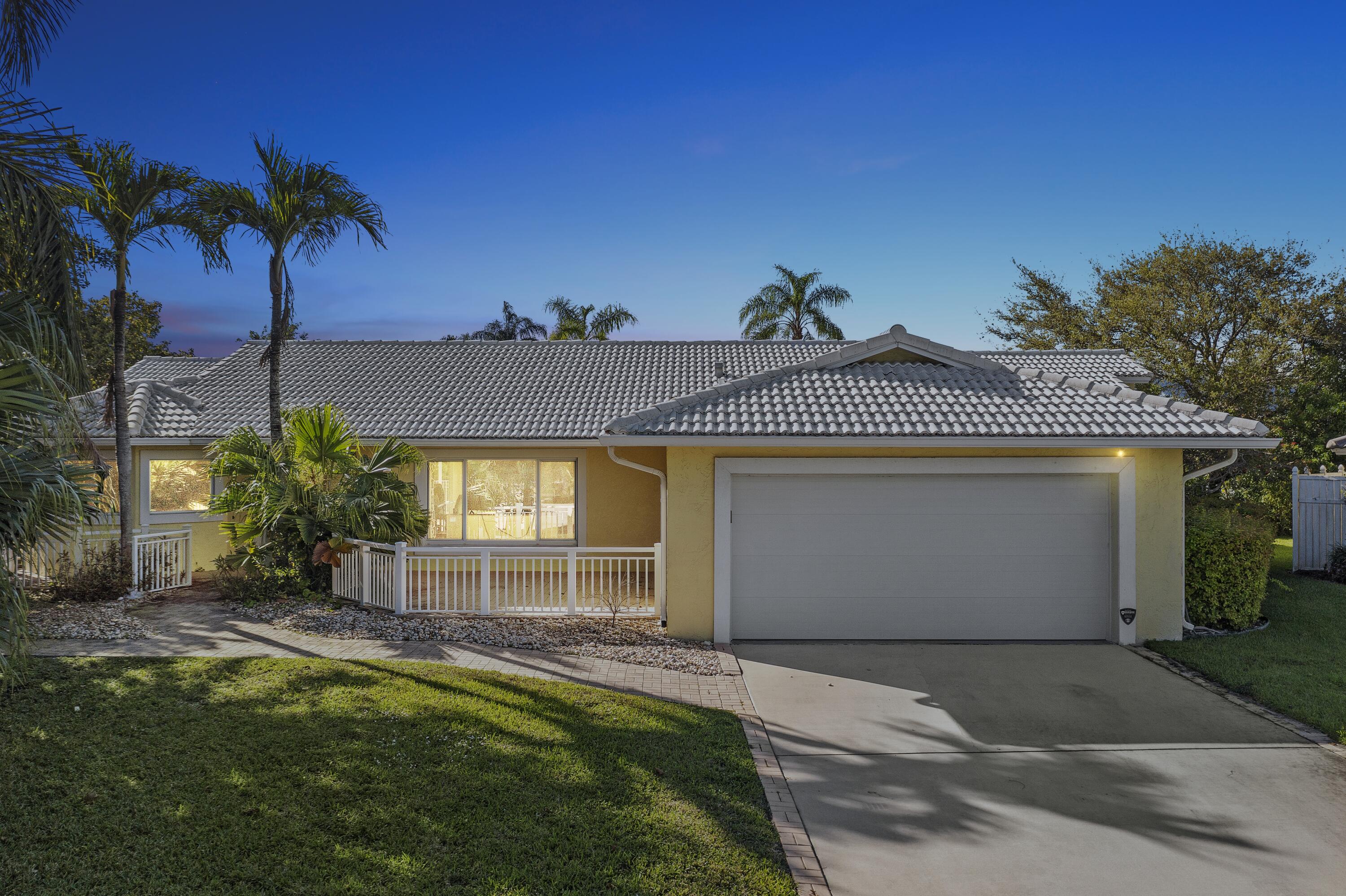 10041 Crosswind Road Boca Raton, FL 33498 - Photo 14 of 17 front sunset1