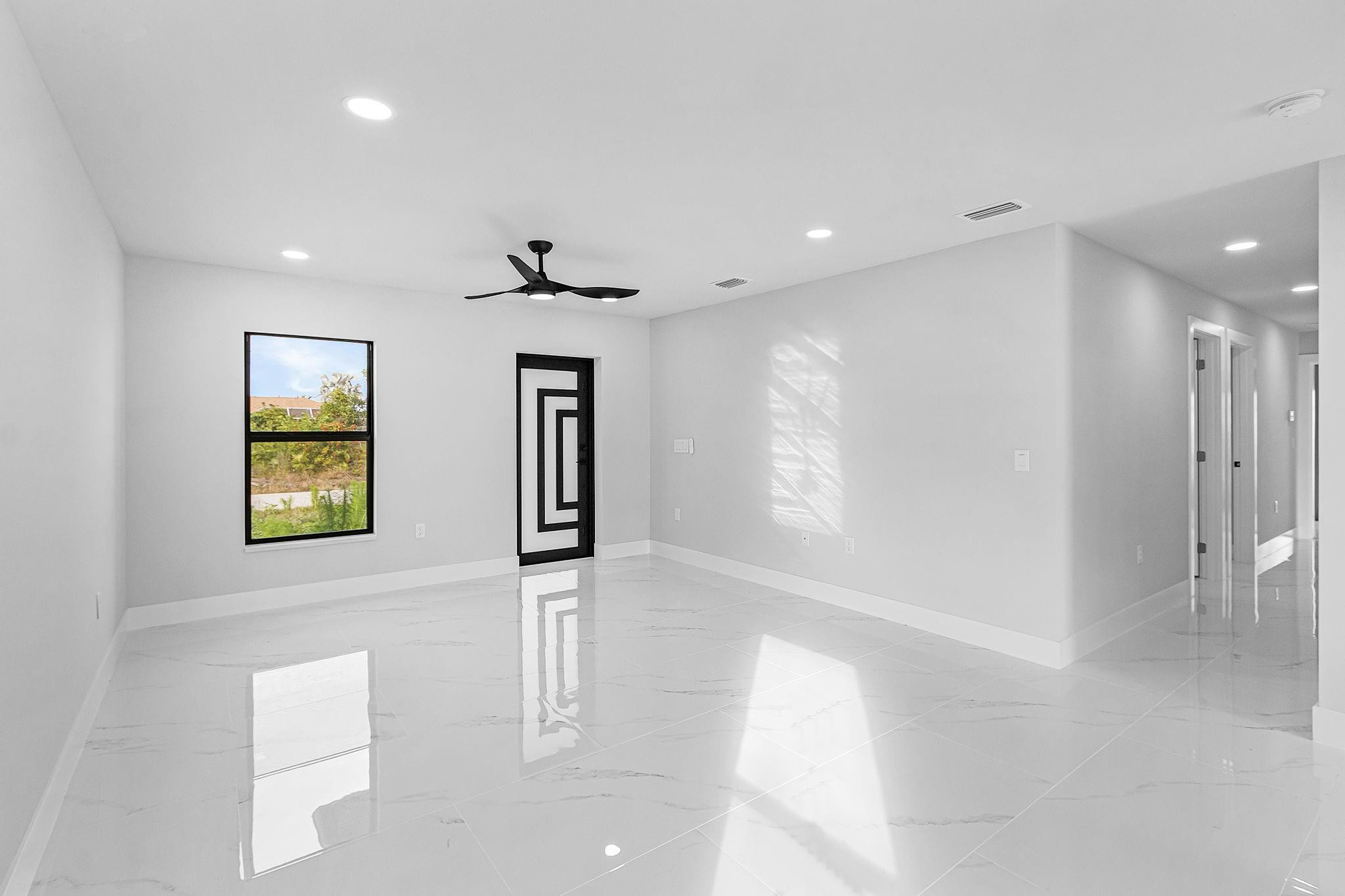 2507 26th Street Southwest Lehigh Acres, FL 33976 - Photo 2 of 10 Impact Windows throughout home