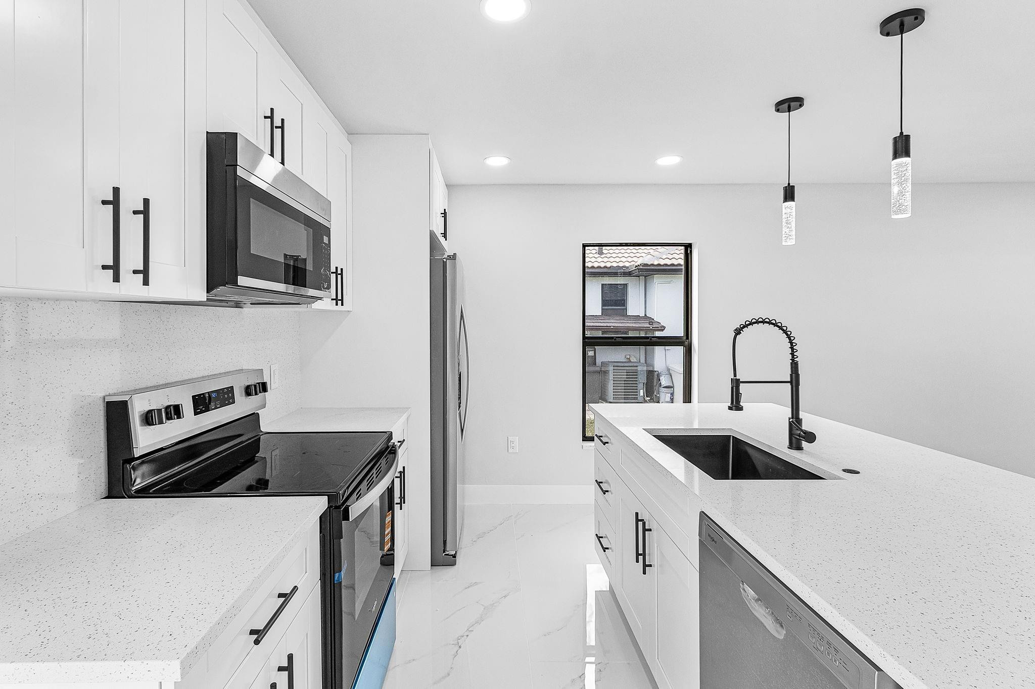 2507 26th Street Southwest Lehigh Acres, FL 33976 - Photo 3 of 10 Light, Bright & Modern