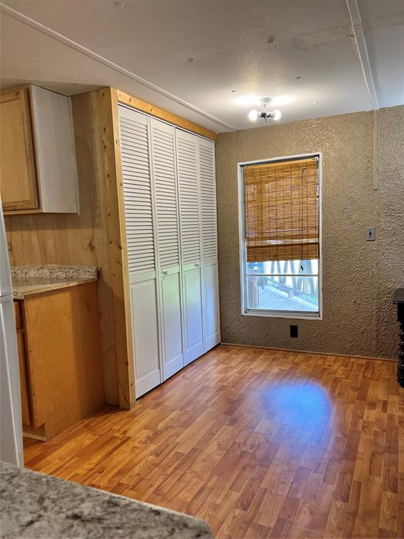 2334 San Bar Road, Unit 46 Graford, TX 76449 - Photo 6 of 37 an empty room with windows