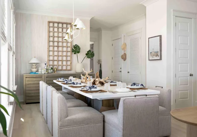 a bedroom with a bed a table and chair