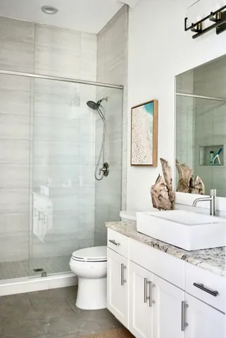 a view of a yard with an ocean view