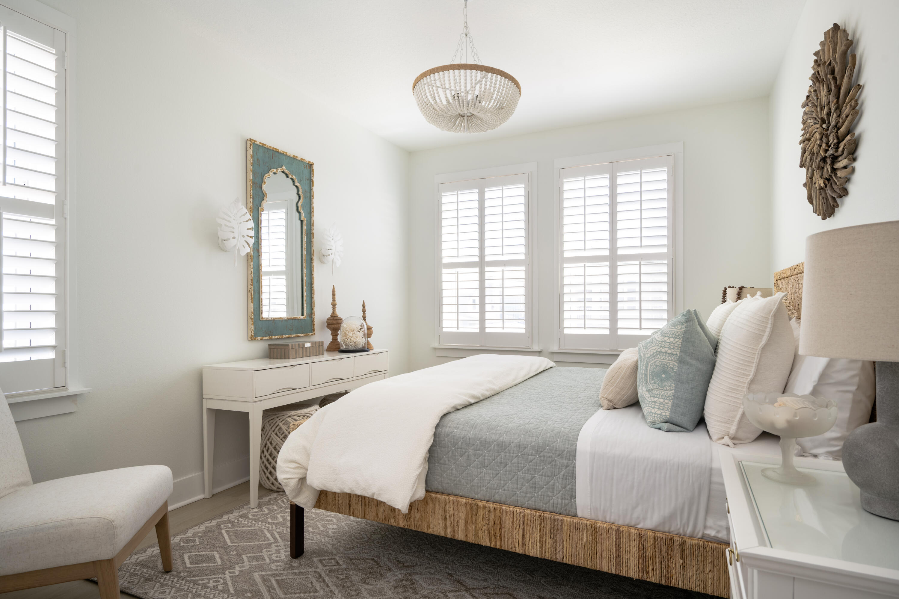 1466 Seaside Circle Navarre, FL 32566 - Photo 36 of 69 a bedroom with a bed a table and chair