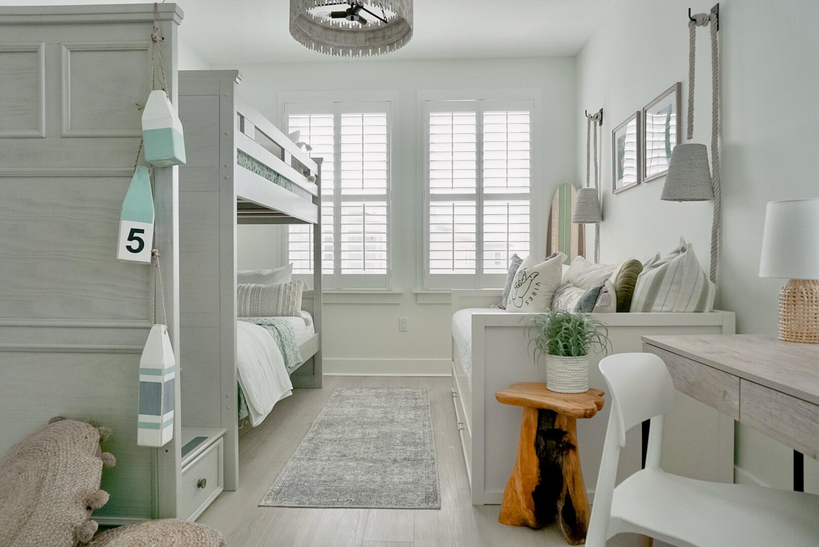 1466 Seaside Circle Navarre, FL 32566 - Photo 39 of 69 a living room with furniture and a potted plant