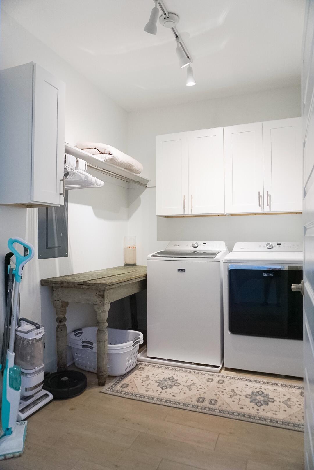 1466 Seaside Circle Navarre, FL 32566 - Photo 44 of 69 a kitchen with a sink cabinets and stainless steel appliances
