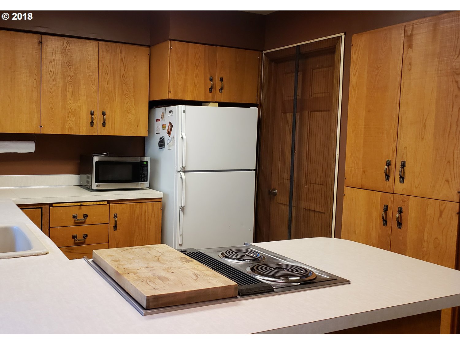 65707 East Barlow Trail Road Rhododendron, OR 97049 - Photo 13 of 32 a kitchen with a refrigerator and a stove