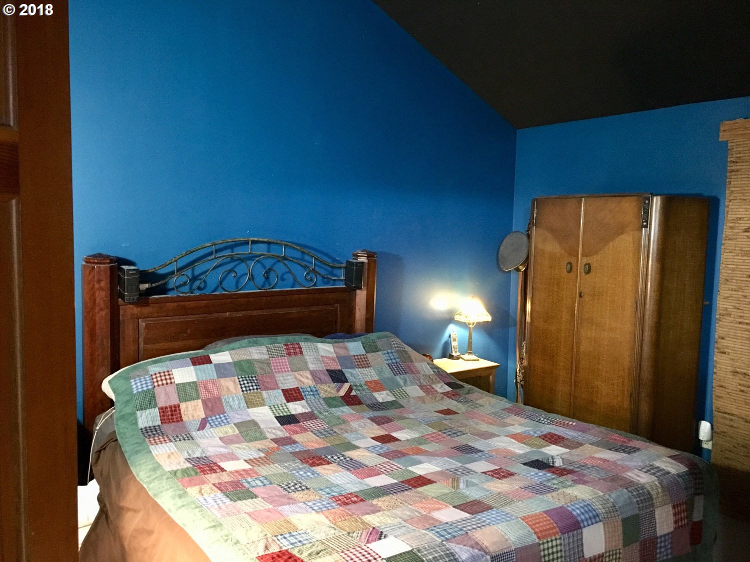 65707 East Barlow Trail Road Rhododendron, OR 97049 - Photo 16 of 32 a bedroom with a bed and teddy bear on bed