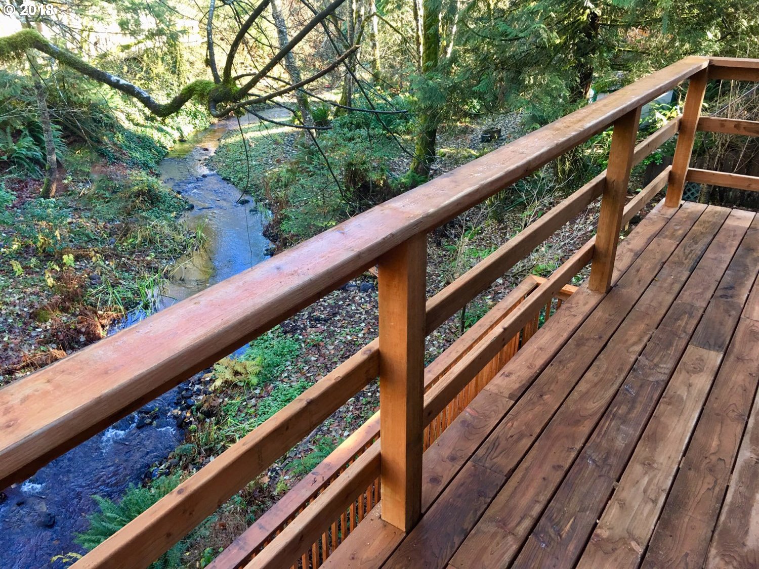 65707 East Barlow Trail Road Rhododendron, OR 97049 - Photo 28 of 32 a view of balcony with wooden floor and stairs