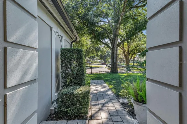 a backyard of a house with lots of green space