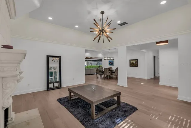 a living room with furniture and a table