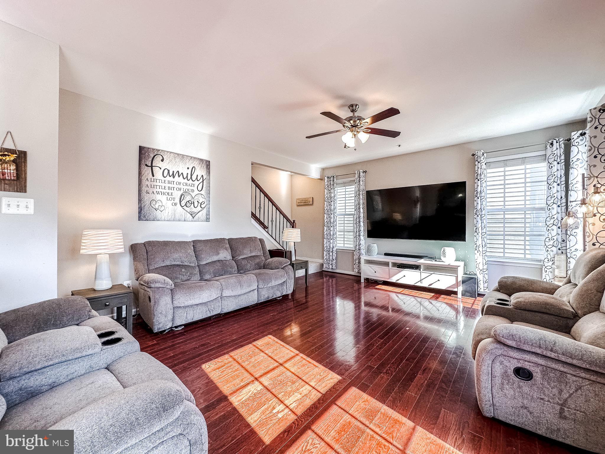 10503 Braddock Run Road Baltimore, MD 21220 - Photo 1 of 64 a living room with furniture and a flat screen tv