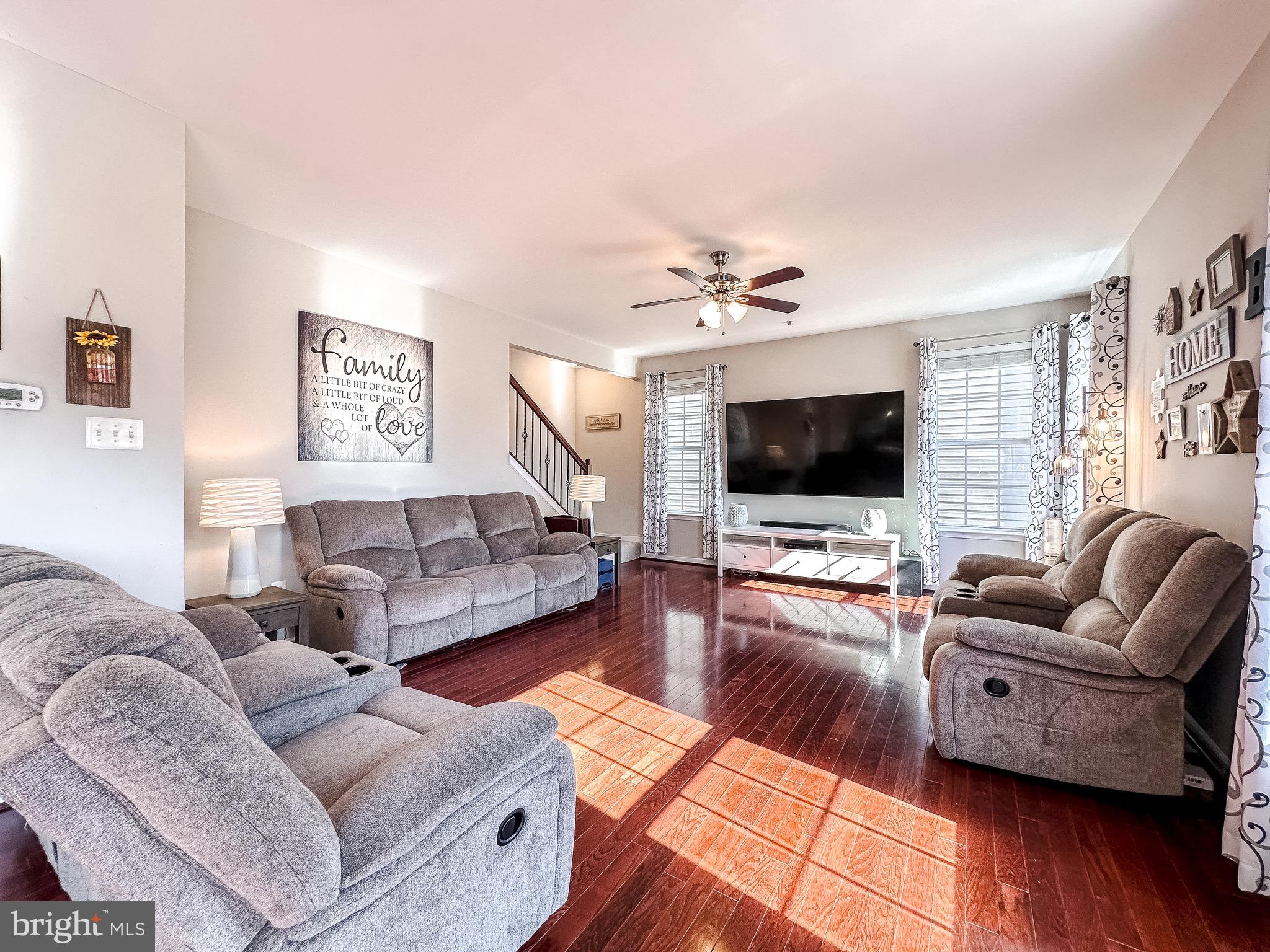 10503 Braddock Run Road Baltimore, MD 21220 - Photo 2 of 64 a living room with furniture and a flat screen tv