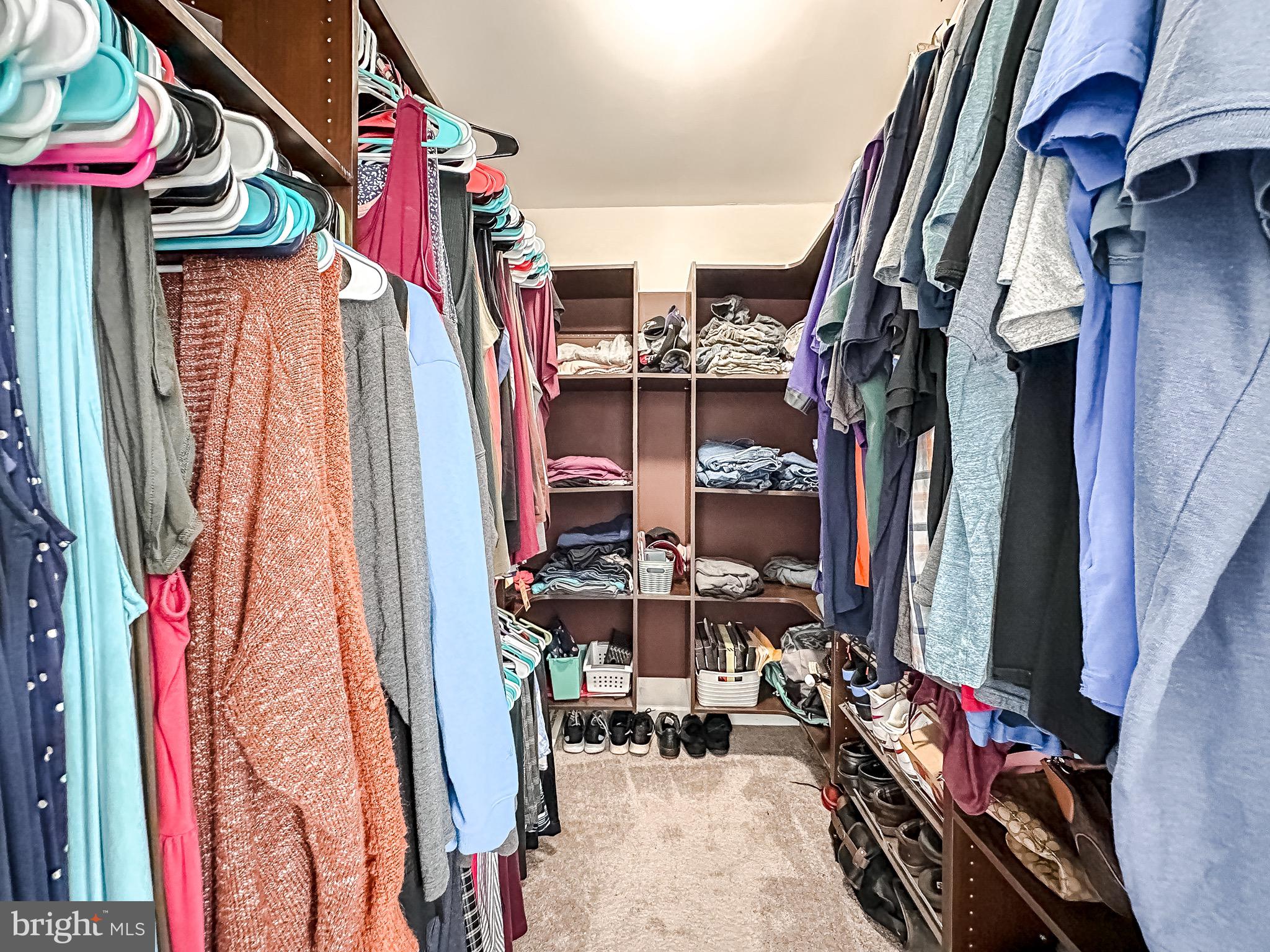 10503 Braddock Run Road Baltimore, MD 21220 - Photo 29 of 64 a view of walk in closet with clothes and shoes