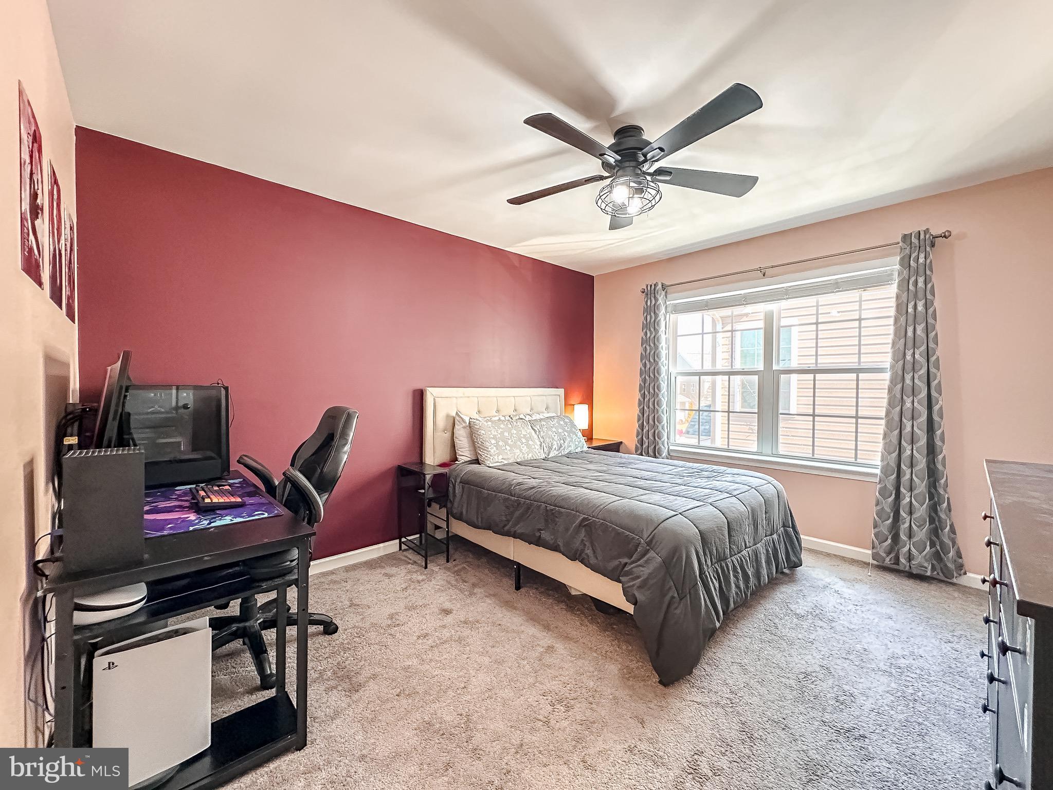 10503 Braddock Run Road Baltimore, MD 21220 - Photo 36 of 64 a bedroom with a bed dresser and a window