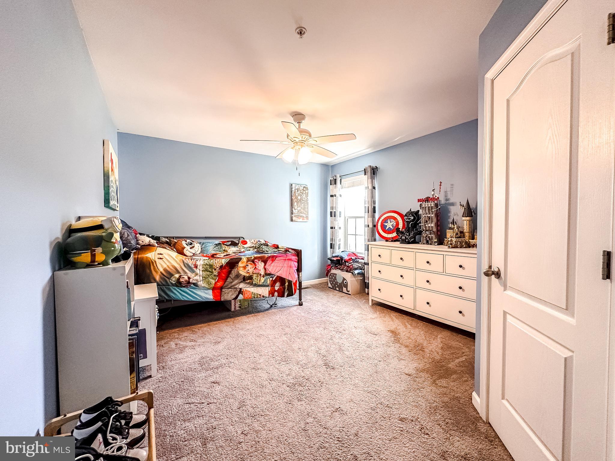 10503 Braddock Run Road Baltimore, MD 21220 - Photo 38 of 64 a bedroom with furniture and a baby crib