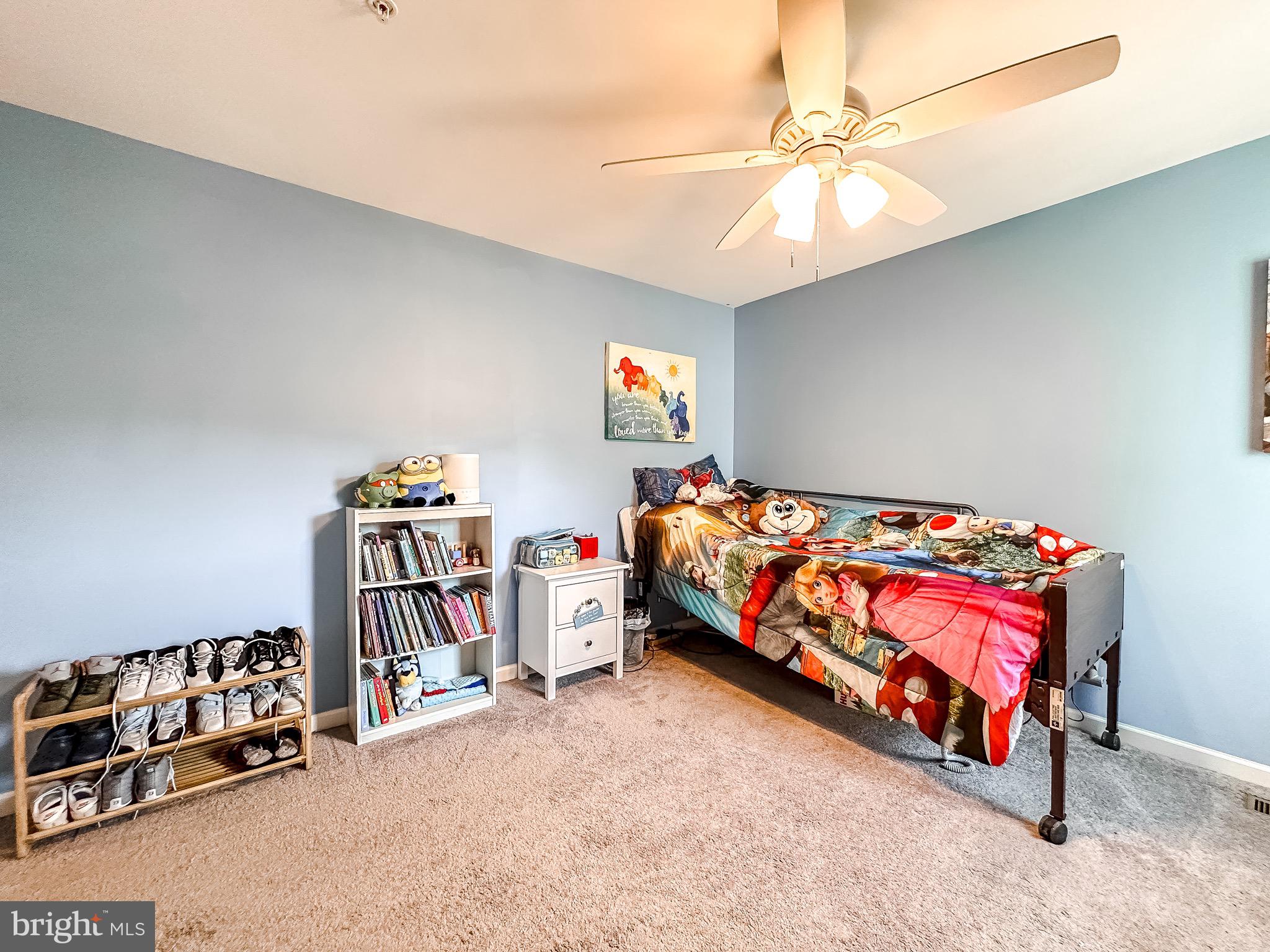 10503 Braddock Run Road Baltimore, MD 21220 - Photo 39 of 64 a bedroom with bed and a chandelier