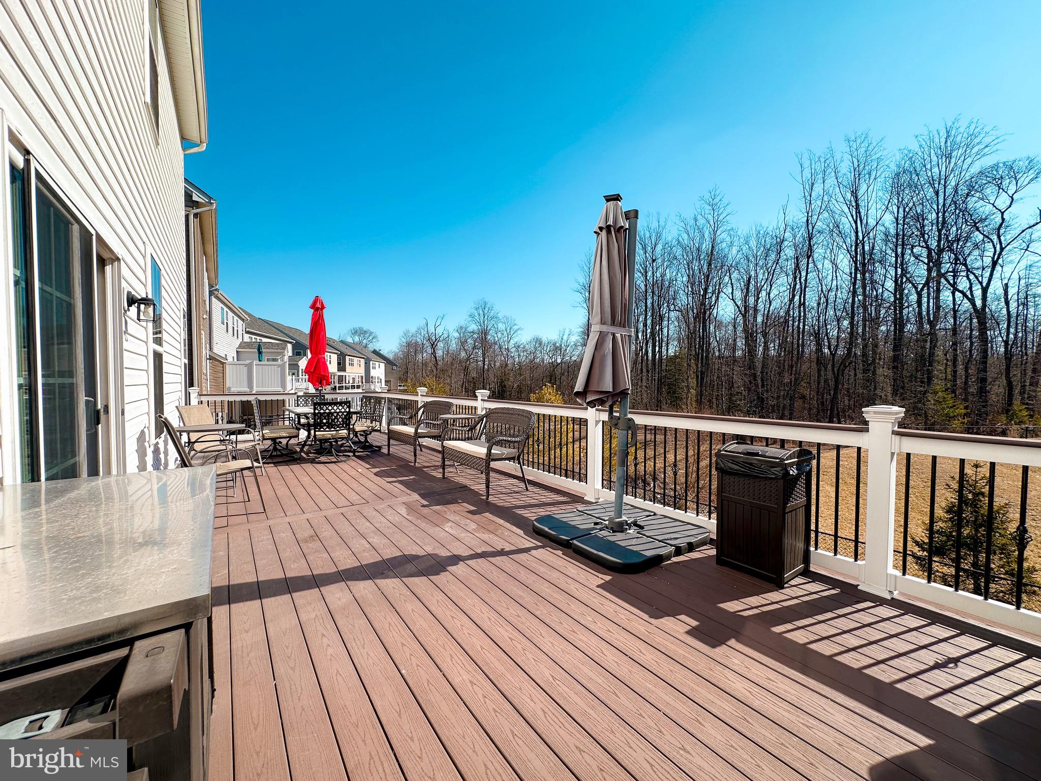 10503 Braddock Run Road Baltimore, MD 21220 - Photo 50 of 64 a view of balcony with deck and wooden floor