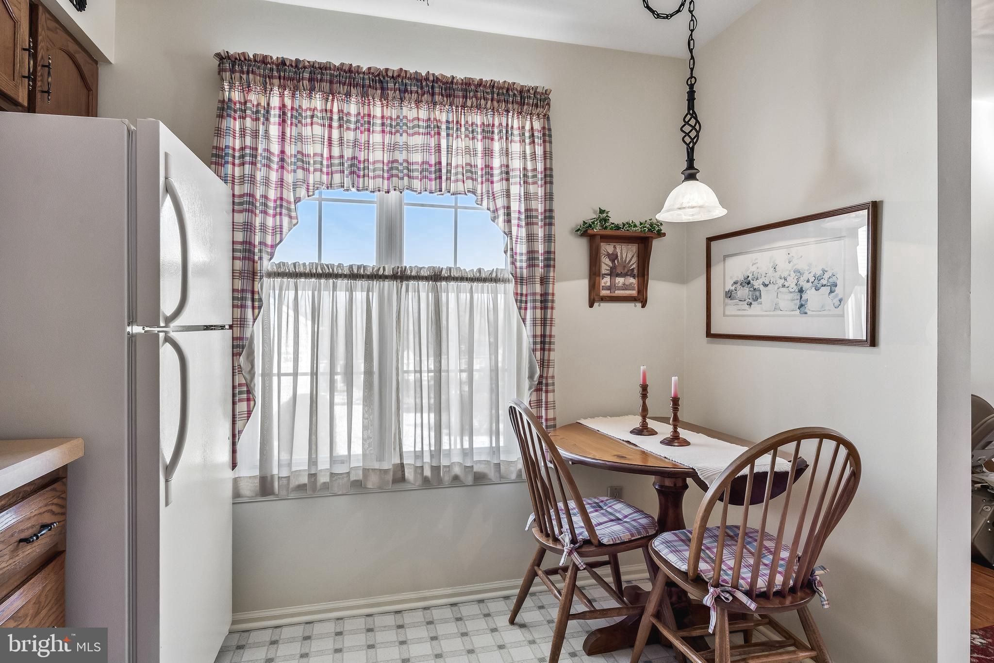 3522B Neils Court Mount Laurel, NJ 08054 - Photo 8 of 25 a view of a dining room with furniture and a window