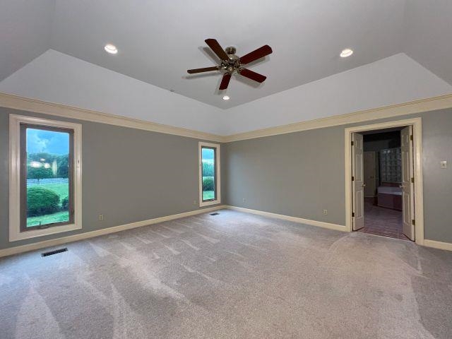 2055 Bobbitt Road Williston, TN 38076 - Photo 16 of 40 Carpeted empty room featuring a raised ceiling, a ceiling fan, baseboards, recessed lighting, and visible vents