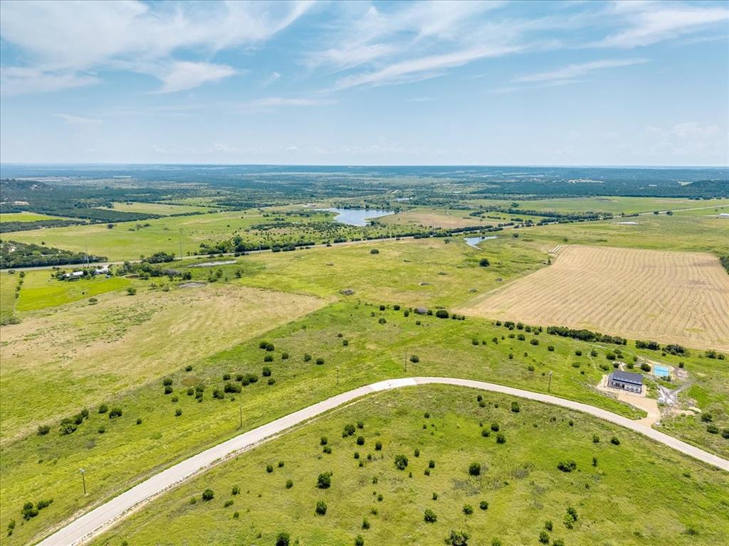 1307 Hidden Vly Road Glen Rose, TX 76043 - Photo 16 of 25 a view of an ocean and beach