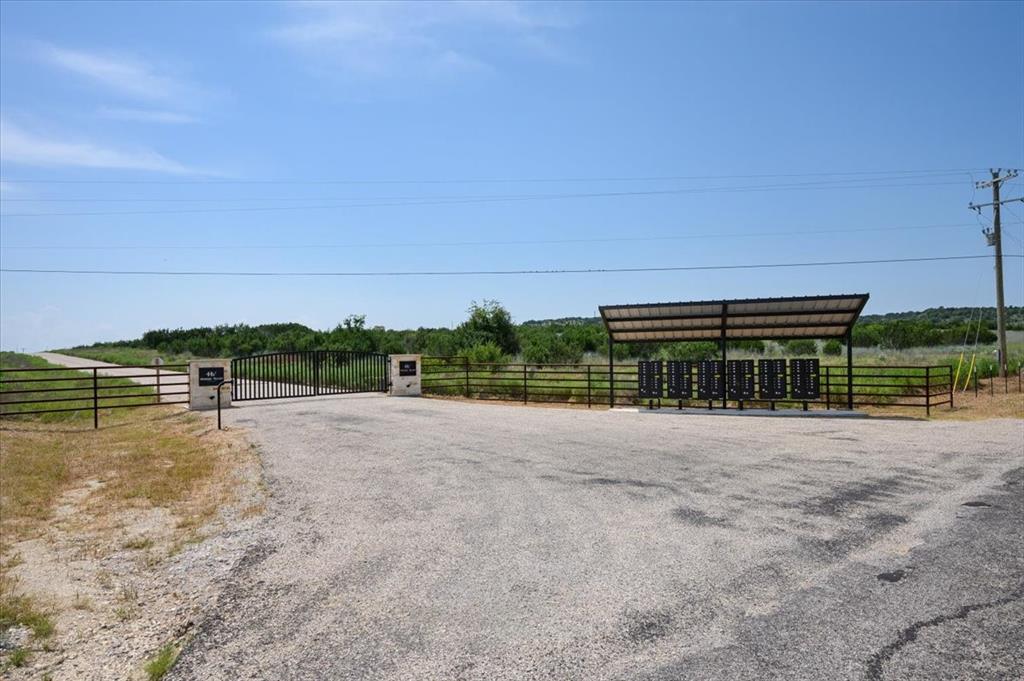 1307 Hidden Vly Road Glen Rose, TX 76043 - Photo 25 of 25 a view of big yard next to a building