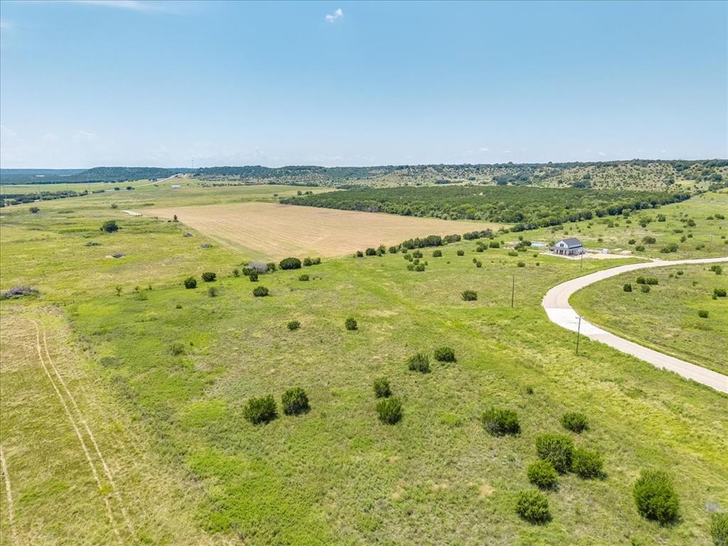 1307 Hidden Vly Road Glen Rose, TX 76043 - Photo 10 of 25 a view of a swimming pool and an ocean