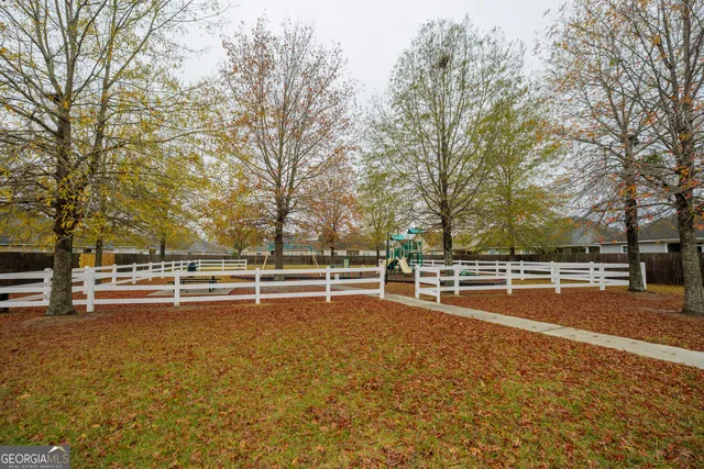 a view of a swimming pool with an outdoor space