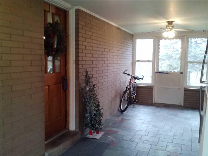 1758 Washington Road Apollo, PA 15613 - Photo 12 of 17 Exterior Front. Breezeway between house and garage.