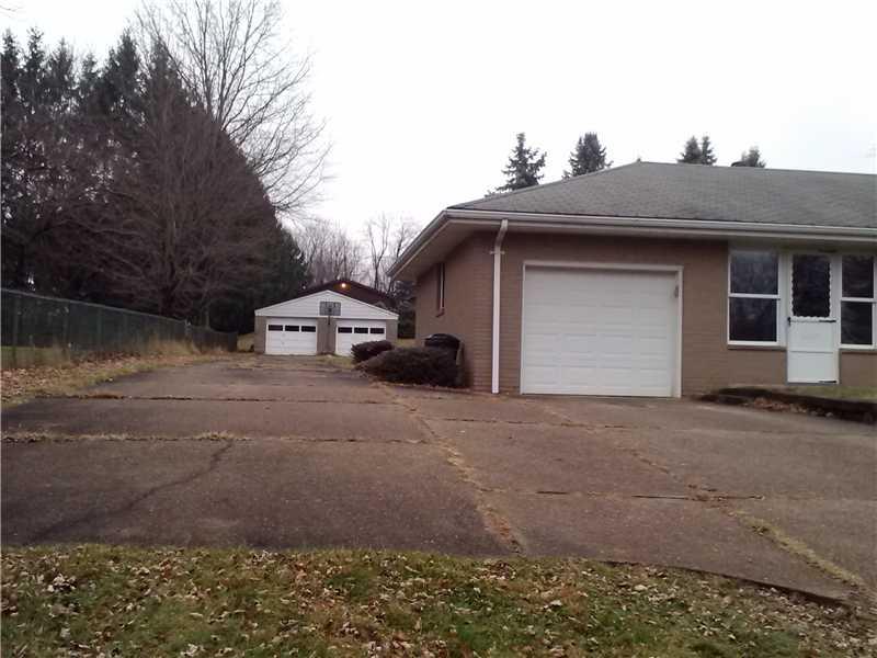 1758 Washington Road Apollo, PA 15613 - Photo 17 of 17 Exterior Front. One car attached garage and 2 car detached garage.